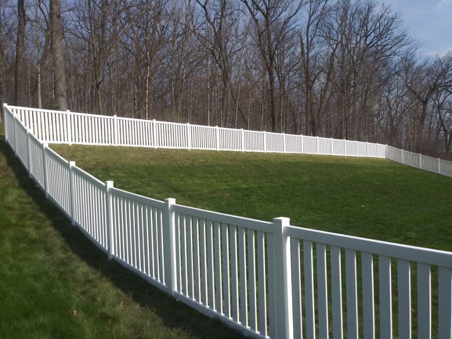 Vinyl fencing; Straight top vinyl fenced backyard photo