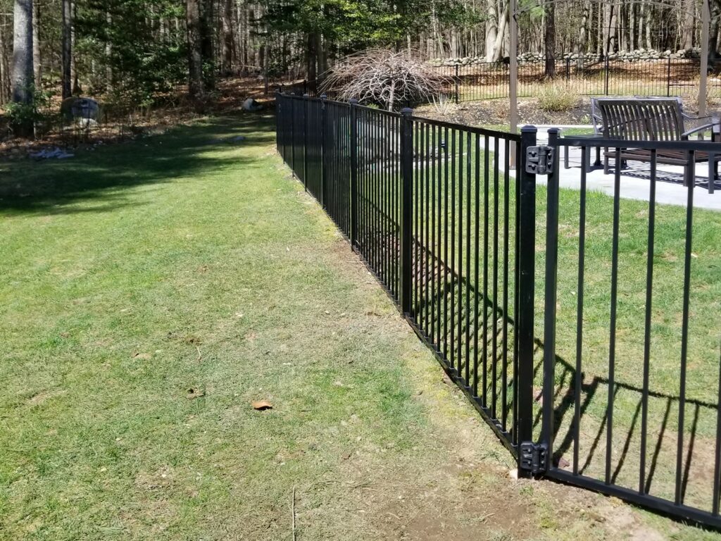 Aluminum fence property line installation by A to Z Quality Fencing