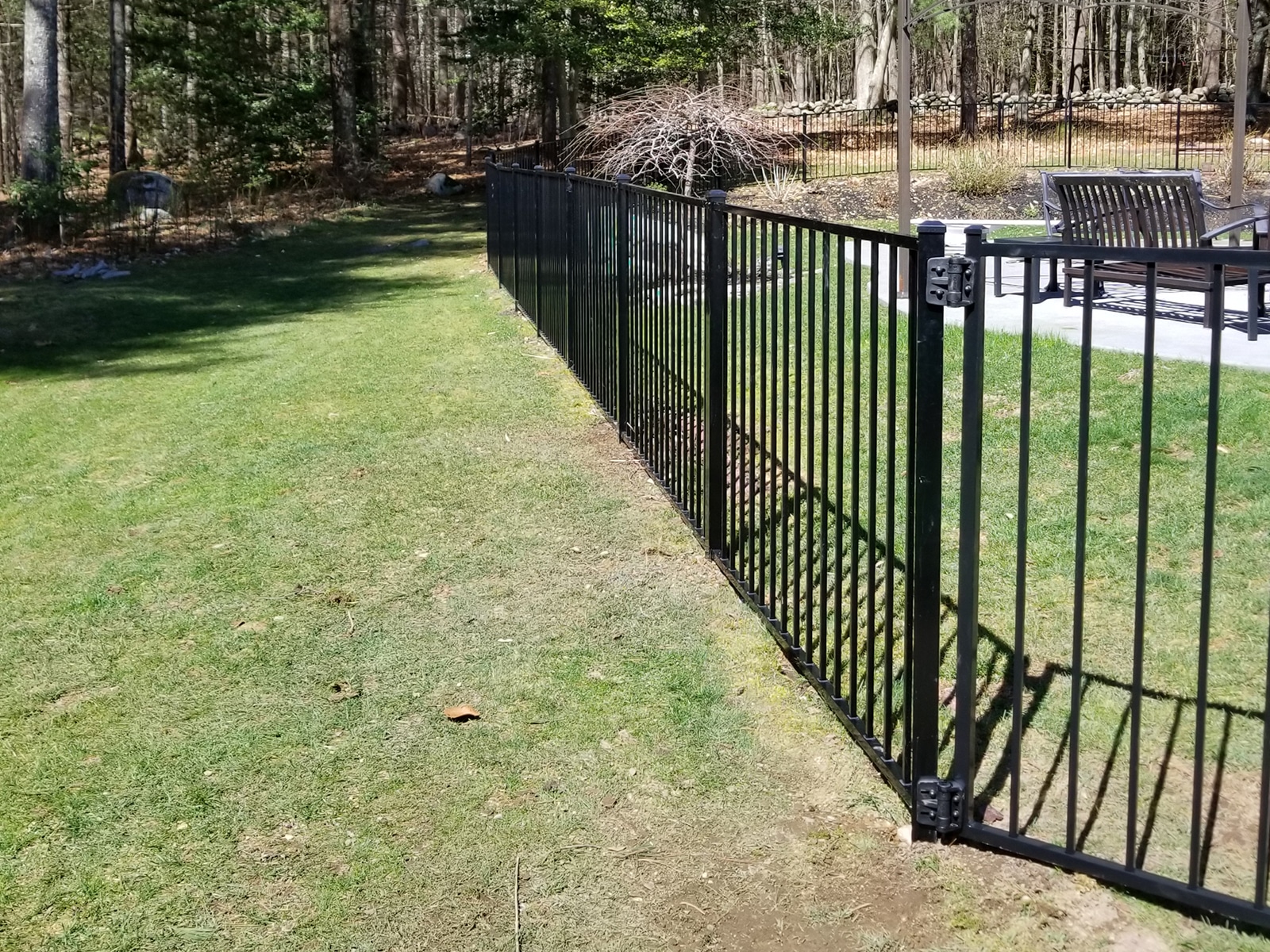 Aluminum fence property line installation by A to Z Quality Fencing