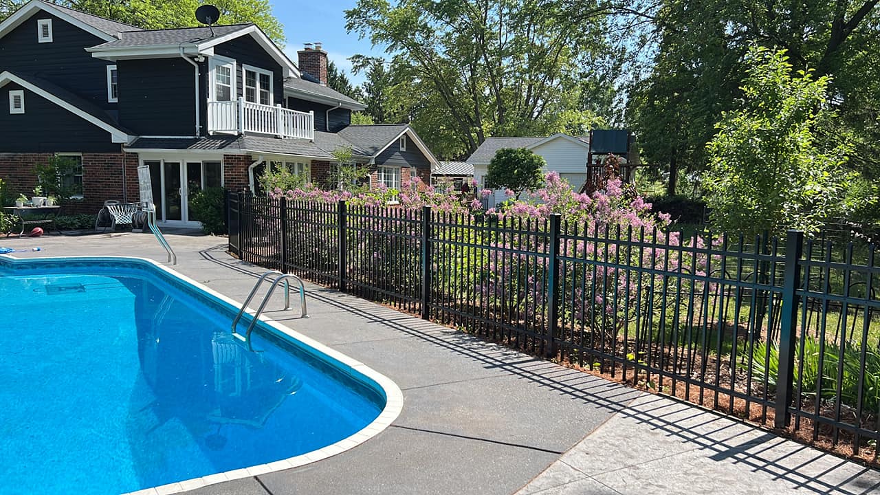 aluminum fence surrounding pool