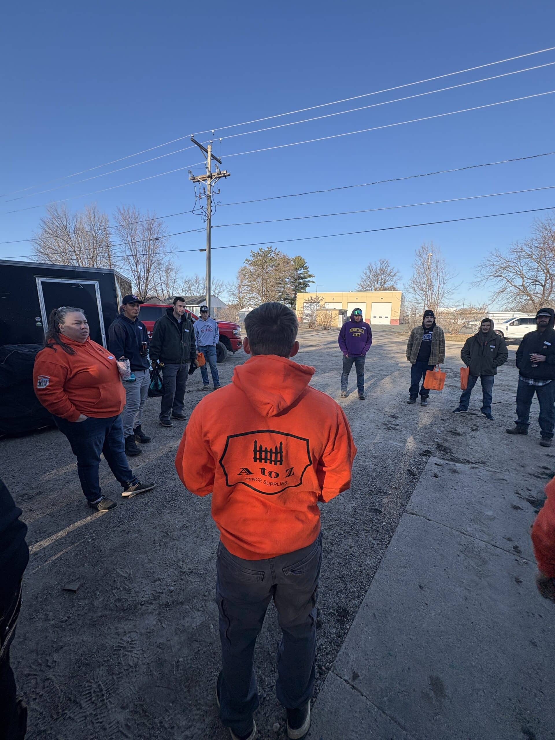 Fence Installation Training early morning huddle to welcome everyone