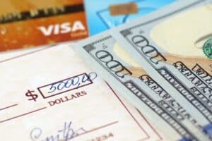 Fence cost in 2026: how much will your project cost? Picture showing different payment methods.